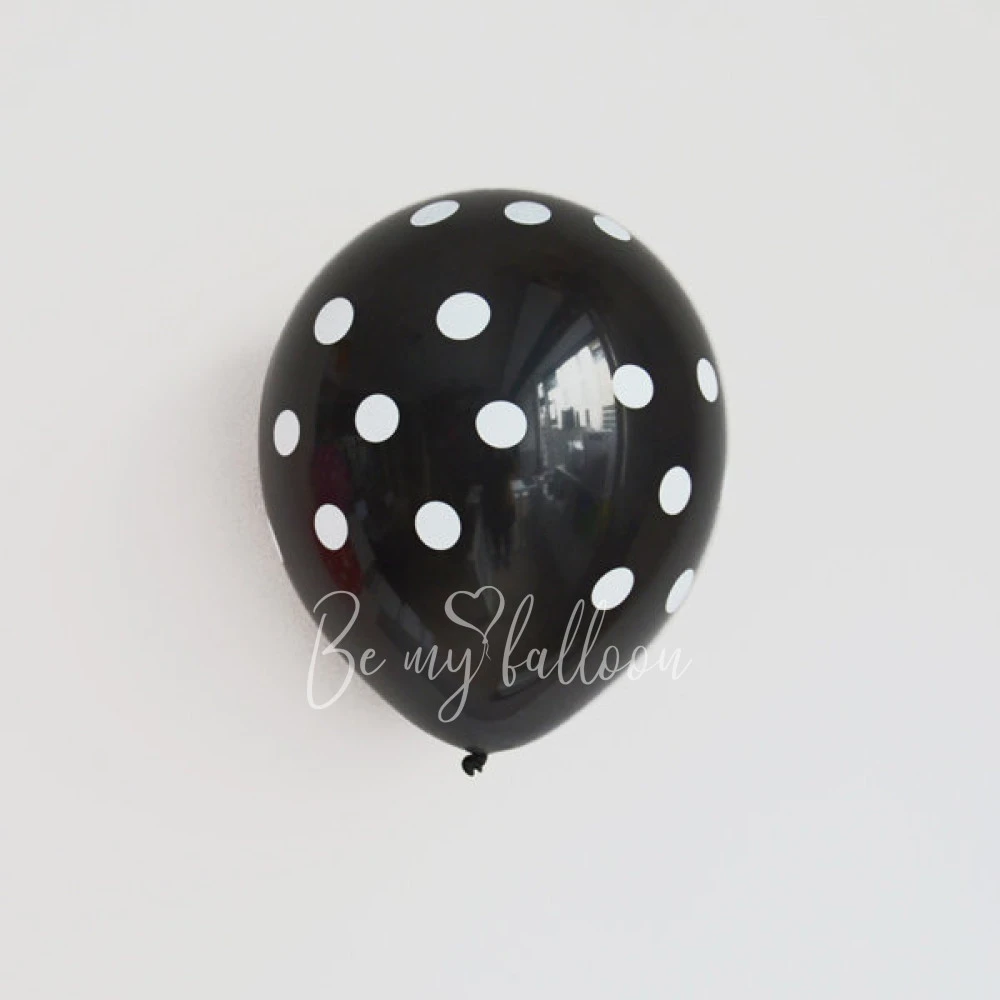 6 black balloons with white spots