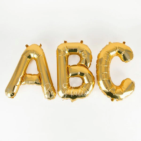 Small gold letter foil balloon