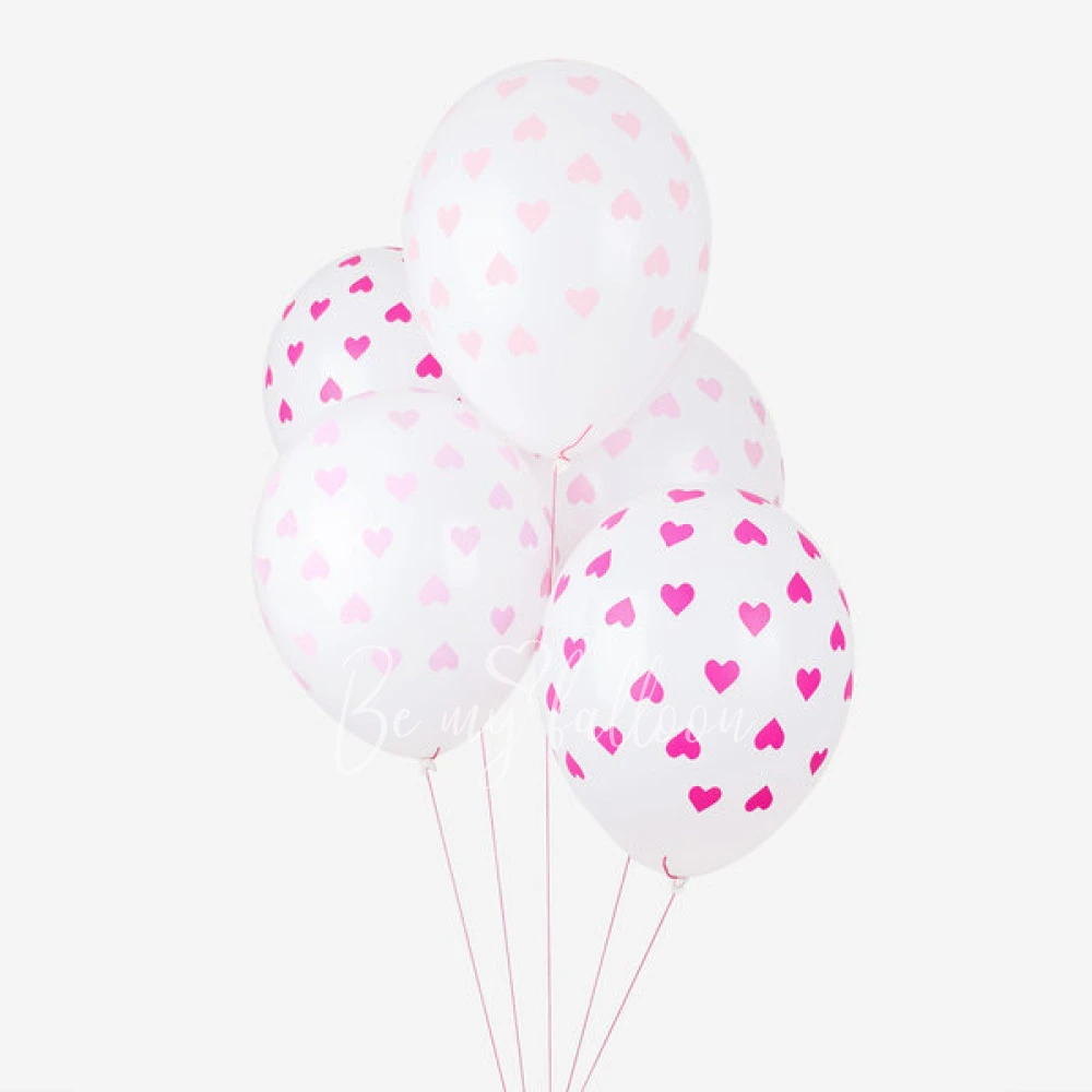 5 heart patterned balloons